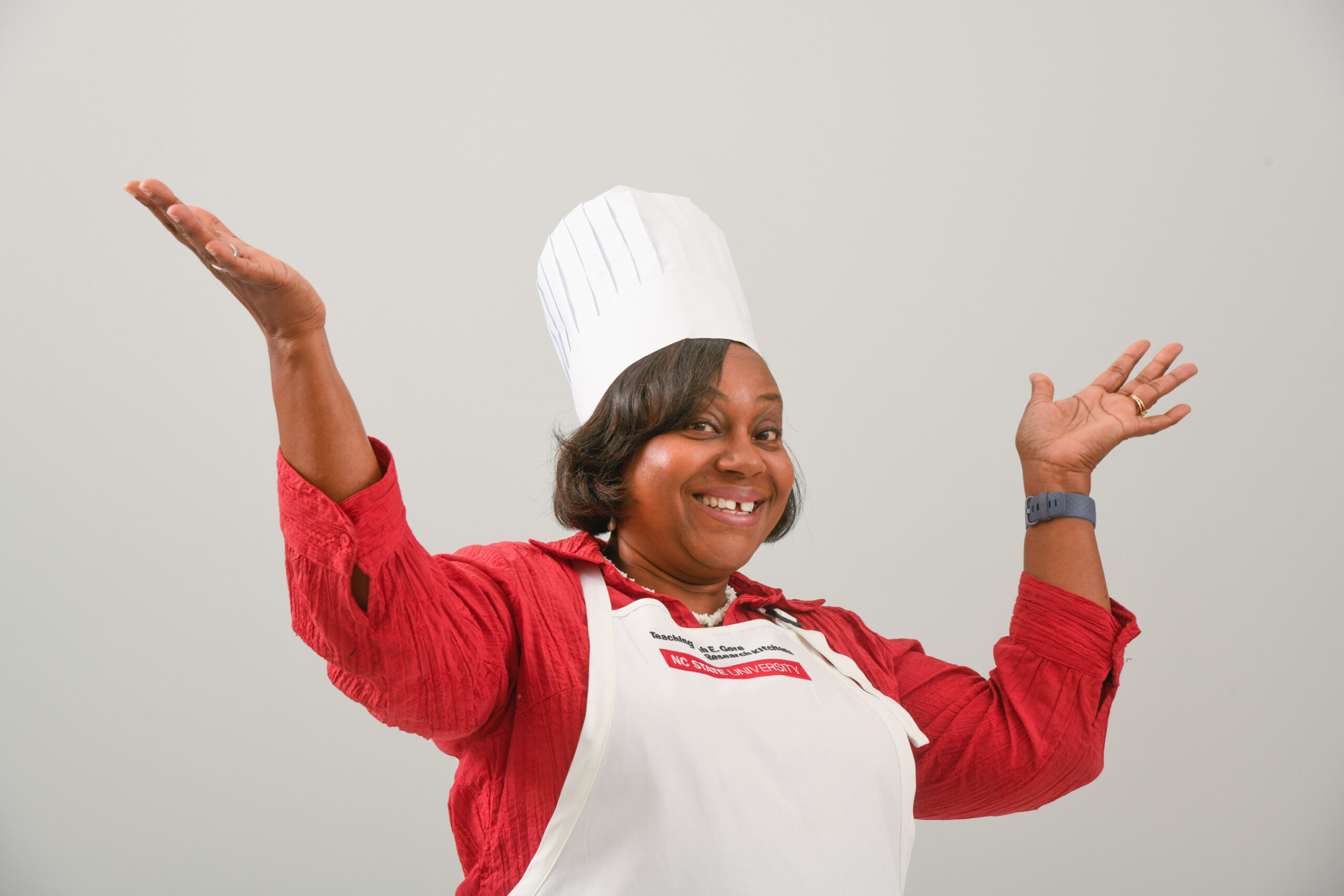 geri bushel with a cooking hat and apron