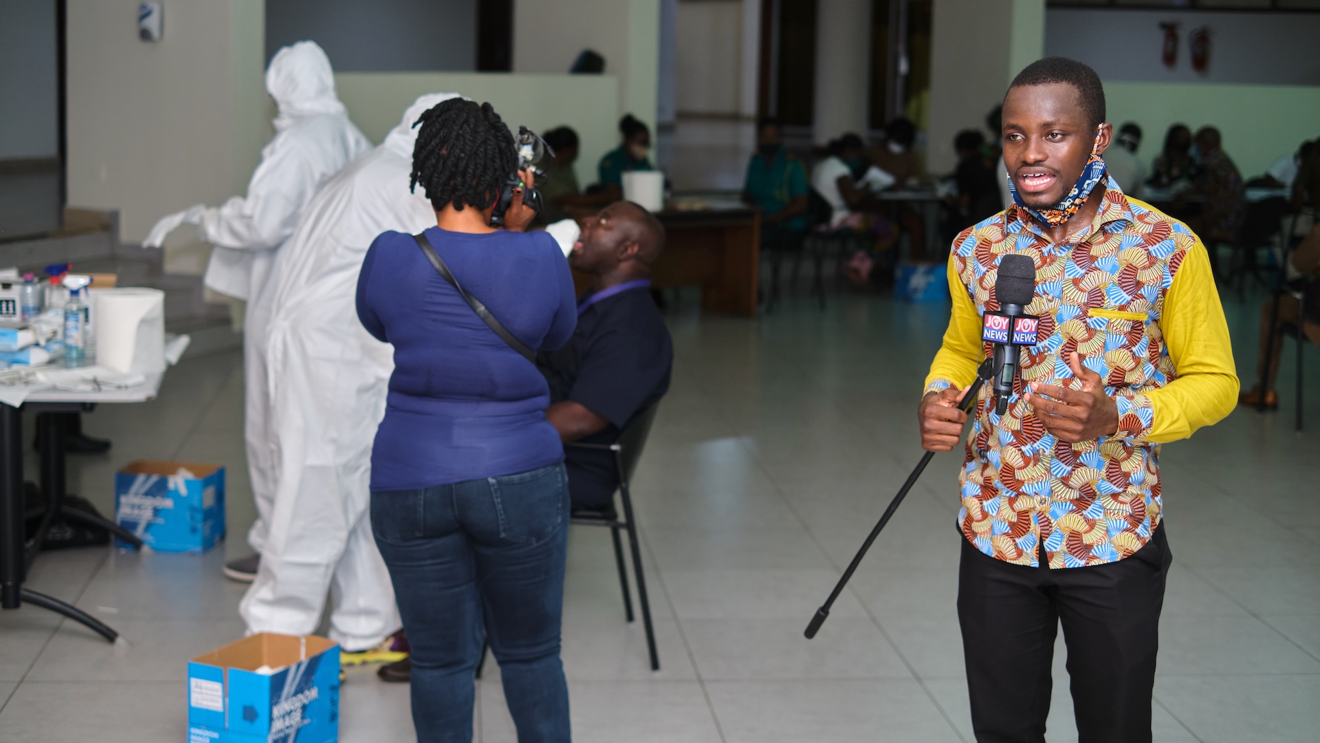 Joseph Gakpo reporting as a journalist at a COVID testing clinic in Ghana