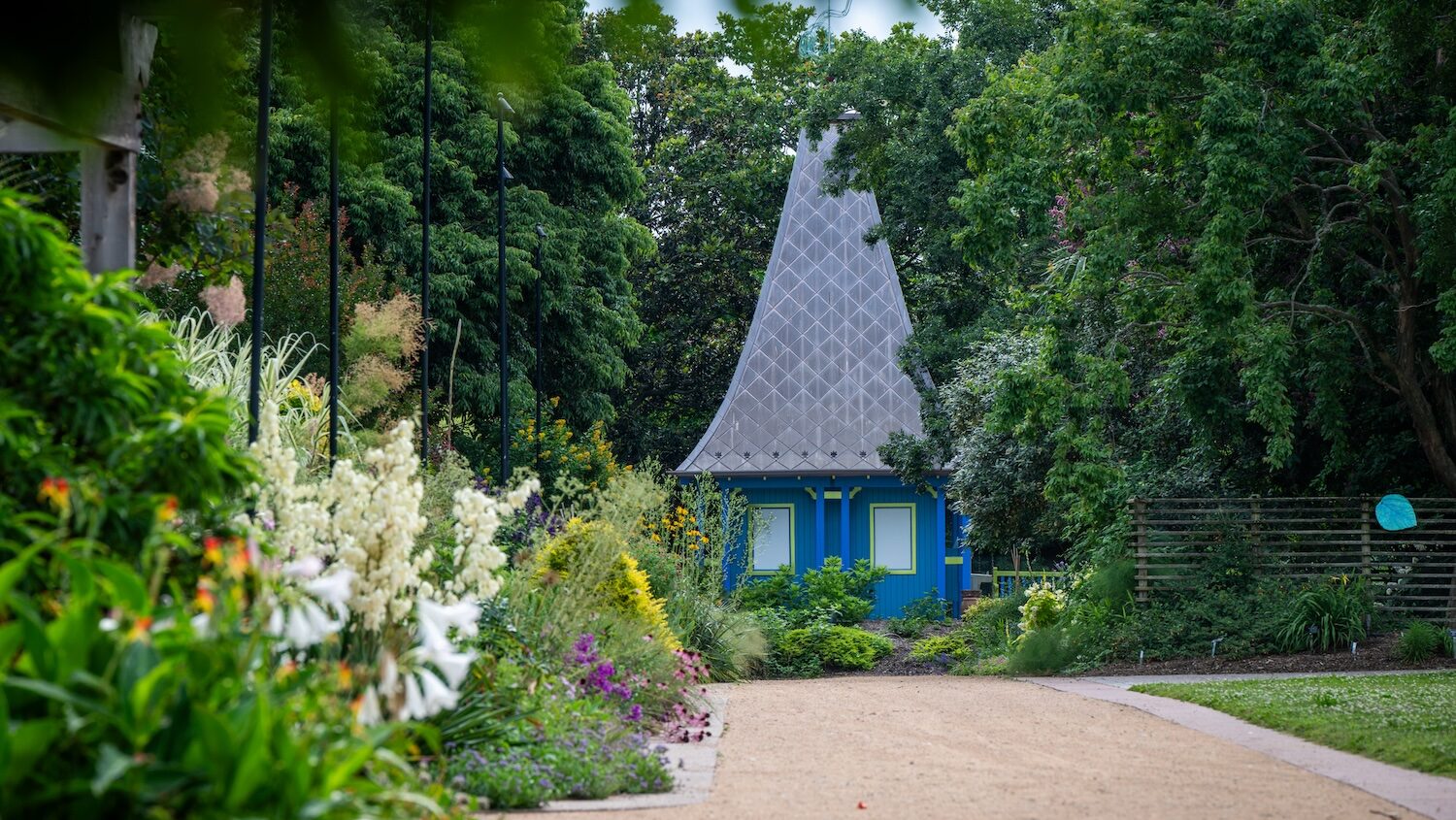 blue building in a garden
